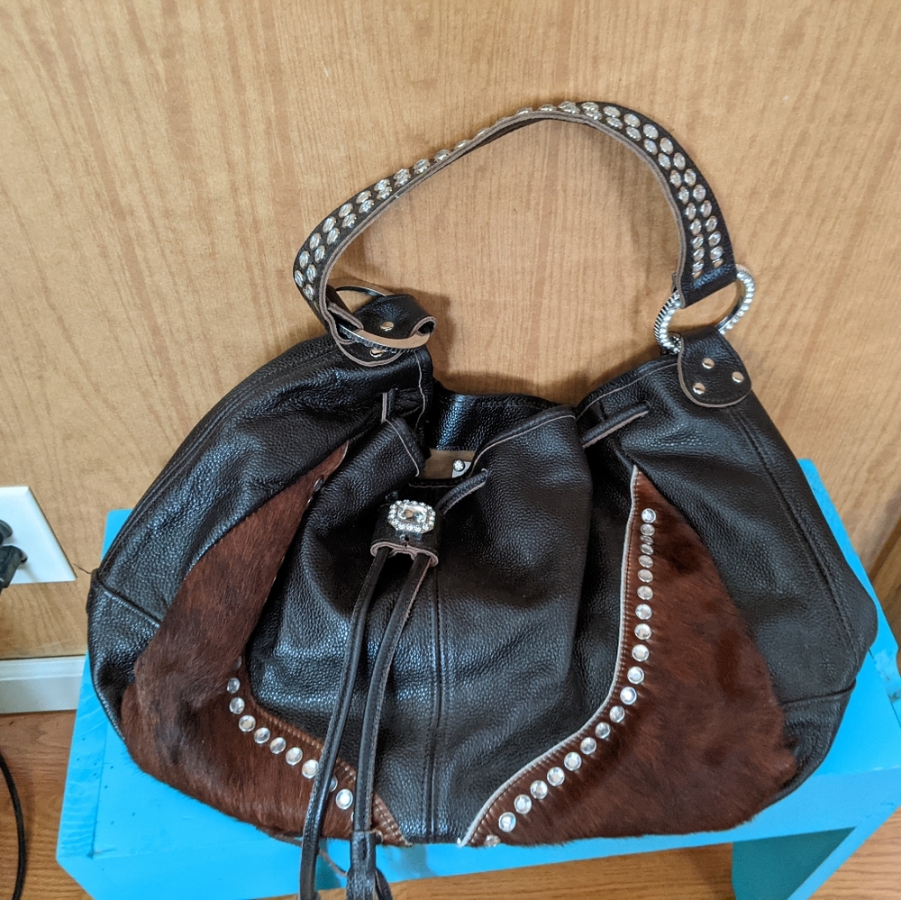 Faux caimon leather  and hair on hide raviani handbag. Soft body bag